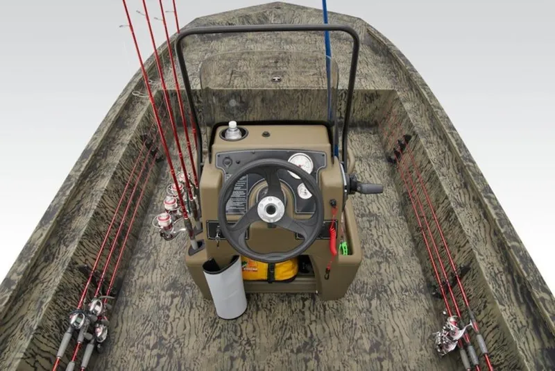 Slide: The Image of 2026 Tracker Grizzly 1860 Center Console boat with fishing rods and camo design. - 11