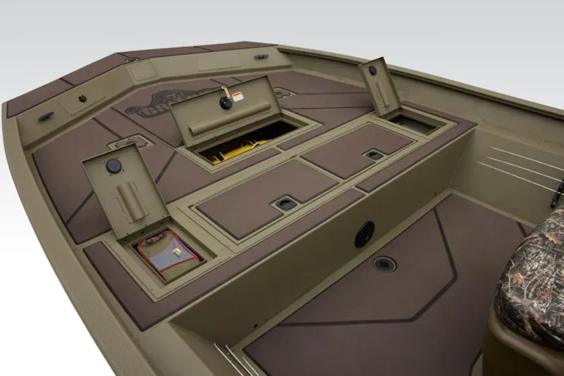 Slide: The Image of 2026 Tracker Grizzly 2072 Center Console boat interior with storage compartments open. - 10