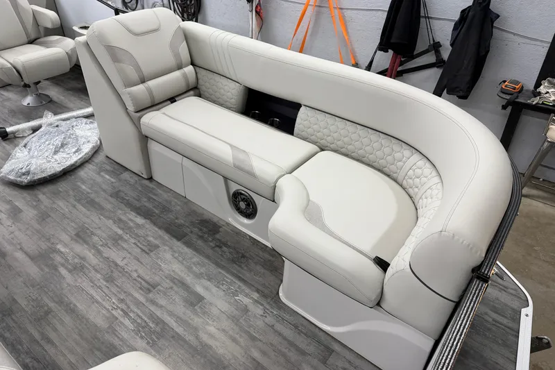 Slide: The Image of 2021 Crest Caribbean LX 230 SLC pontoon boat with luxurious seating and modern design. - 5