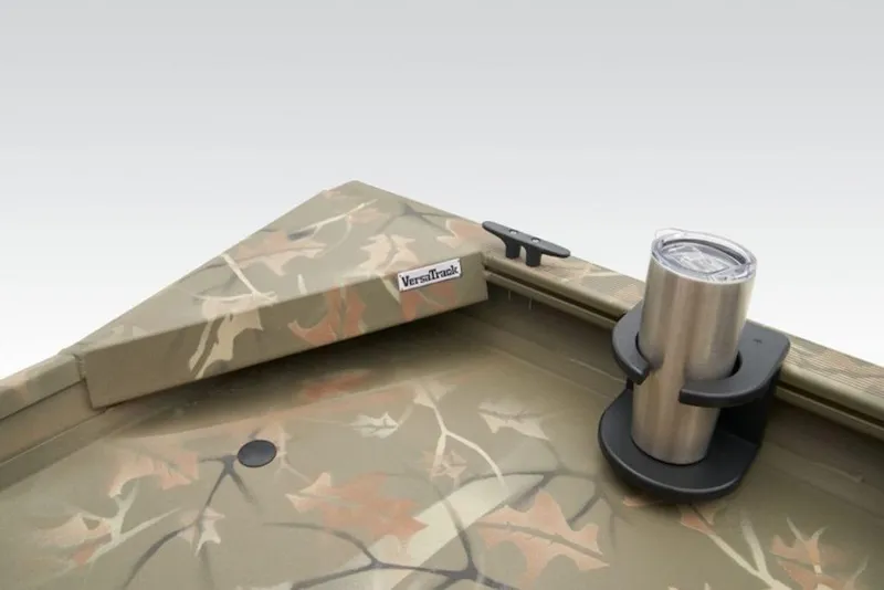 Slide: The Image of 2026 Tracker Grizzly 1754 SC boat with camo design and cup holder. - 13