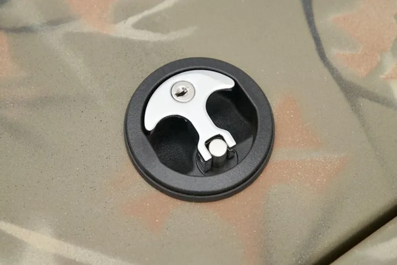 Slide: The Image of Lock mechanism on 2026 Tracker Grizzly 1754 SC boat, featuring camo design. - 8