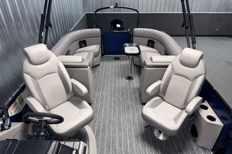 Slide: The Image of Interior of 2026 Premier 230 SunSation RF Tritoon with luxurious seating and modern design. - 11