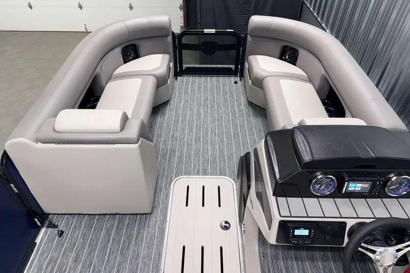 Slide: The Image of Luxurious interior of 2026 Premier 230 SunSation RF Tritoon with plush seating and modern dashboard. - 12