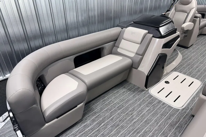 Slide: The Image of Luxurious interior of 2026 Premier 230 SunSation RF Tritoon with plush seating and modern design. - 14
