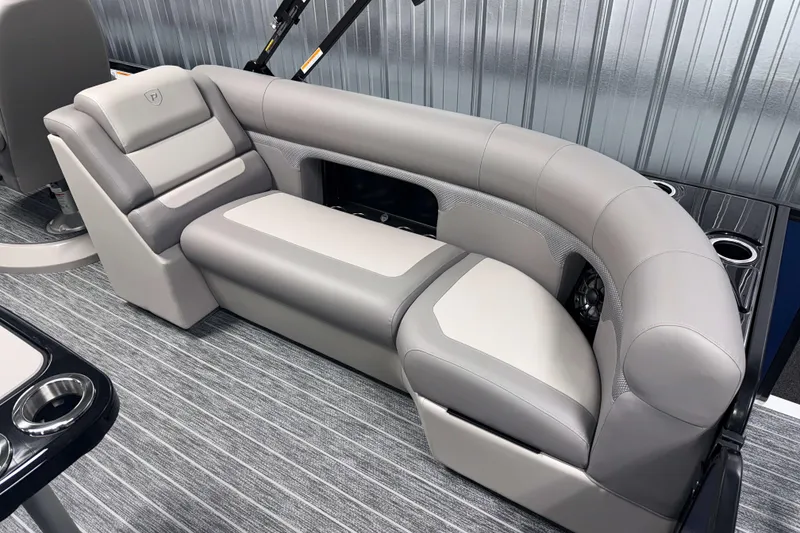 Slide: The Image of Luxurious seating on 2026 Premier 230 SunSation RF Tritoon with sleek gray upholstery. - 3
