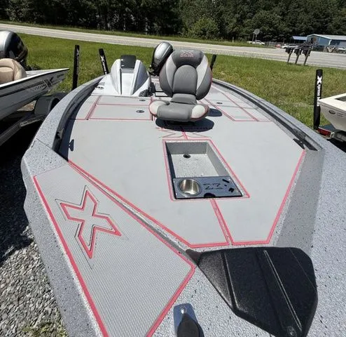 Slide: The Image of 2023 Xpress Boats H18 fishing boat with sleek design and comfortable seating. - 4