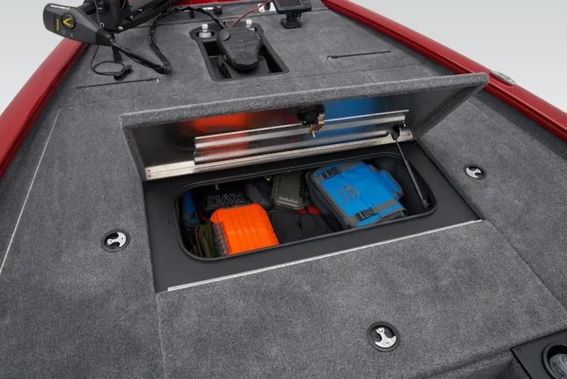 Slide: The Image of 2025 Tracker Pro Team 195 Tournament Edition boat storage compartment with gear and equipment. - 10