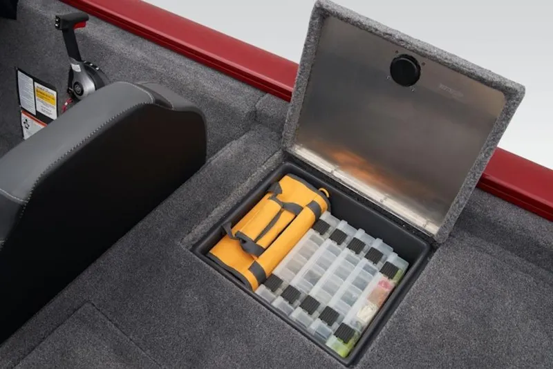Slide: The Image of 2025 Tracker Pro Team 195 Tournament Edition boat storage compartment with organized gear. - 12