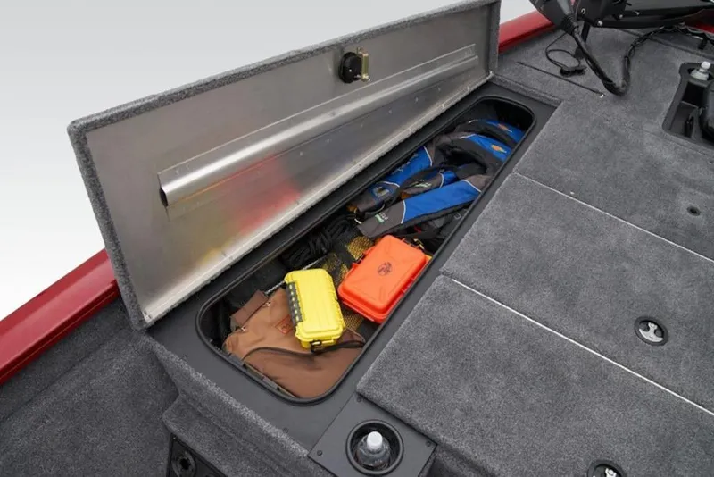 Slide: The Image of 2025 Tracker Pro Team 195 Tournament Edition boat storage compartment with gear and accessories. - 4