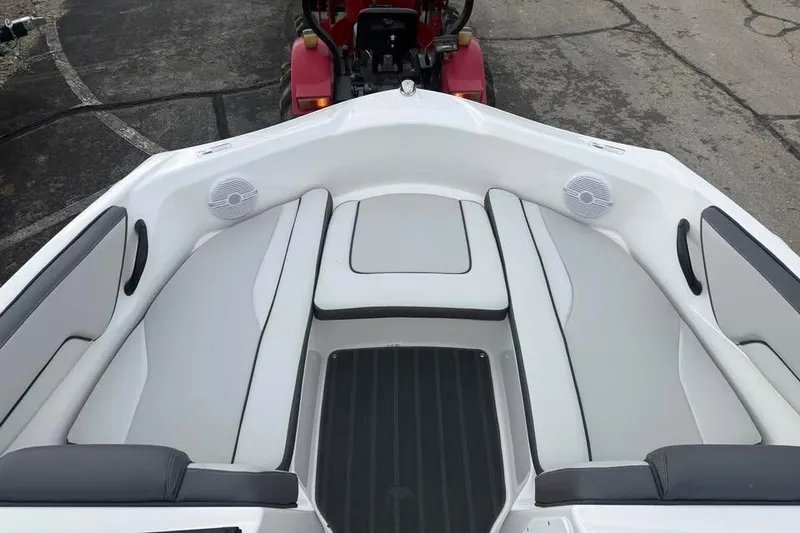 Slide: The Image of 2026 Yamaha Boats SX190 interior with white seating and speakers. - 10