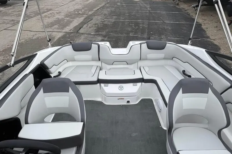 Slide: The Image of 2026 Yamaha Boats SX190 interior with sleek seating and modern design. - 11