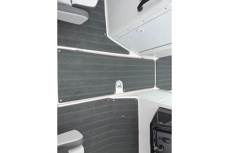 Slide: The Image of 2026 Yamaha Boats SX190 interior with sleek, modern design and comfortable seating. - 13