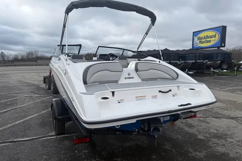 Slide: The Image of 2026 Yamaha Boats SX190 on trailer at BlackBeard Marine dealership. - 5