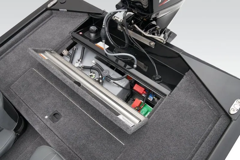 Slide: The Image of 2025 Tracker Pro 170 boat engine compartment with wiring and components visible. - 11