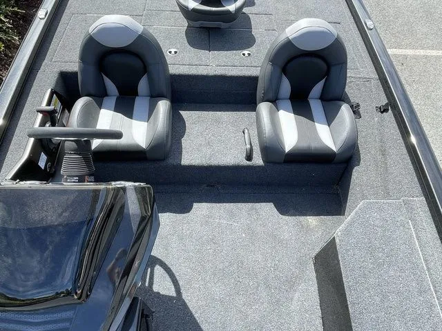 Slide: The Image of 2023 Vexus AVX181 boat interior with dual seats and steering console. - 12