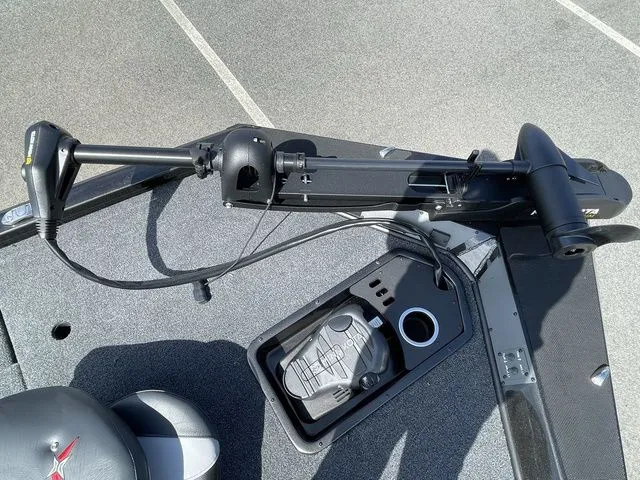 Slide: The Image of 2023 Vexus AVX181 boat deck with trolling motor and foot pedal controls. - 9