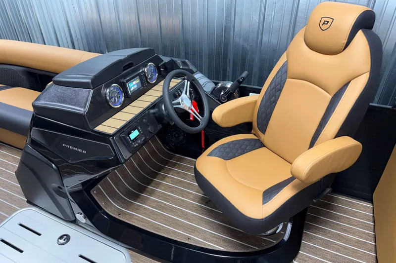 Slide: The Image of Luxurious interior of 2026 Premier 230 SunSation RF Tritoon with tan and black seating. - 11