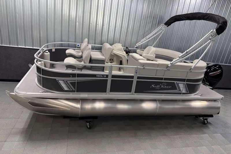 The Image of 2026 SunChaser Vista 18 Fish pontoon boat in showroom, side view. - 0
