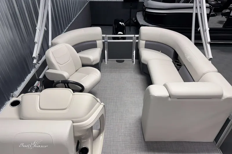 Slide: The Image of 2026 SunChaser Vista 18 Fish pontoon boat interior with plush seating and modern design. - 12