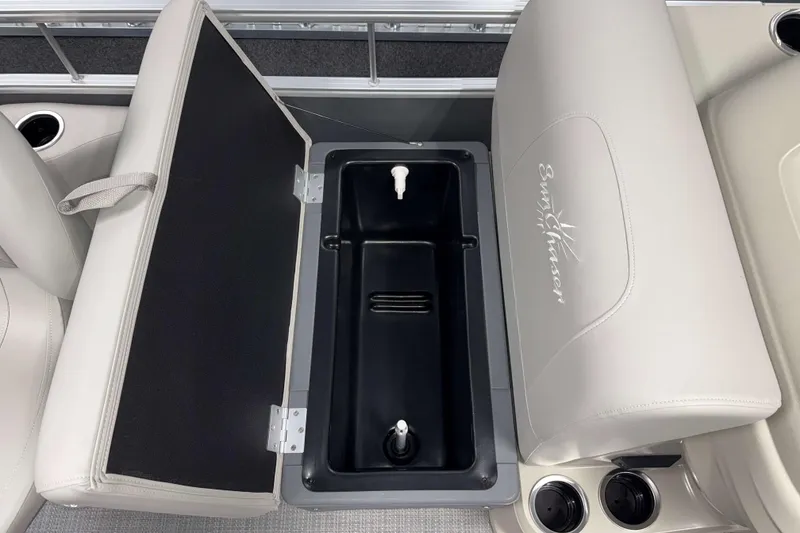 Slide: The Image of SunChaser Vista 18 Fish 2026 boat seat with storage compartment and cup holders. - 14