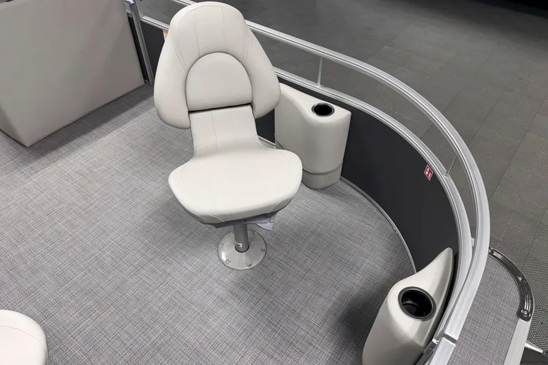 Slide: The Image of 2026 SunChaser Vista 18 Fish boat interior with swivel chair and cup holders. - 16