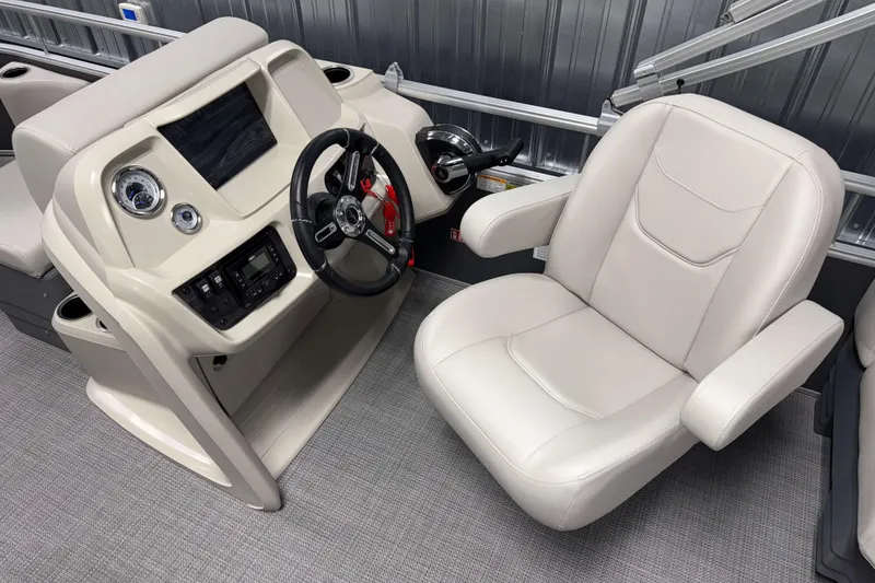 Slide: The Image of 2026 SunChaser Vista 18 Fish boat interior with steering console and captain's chair. - 5