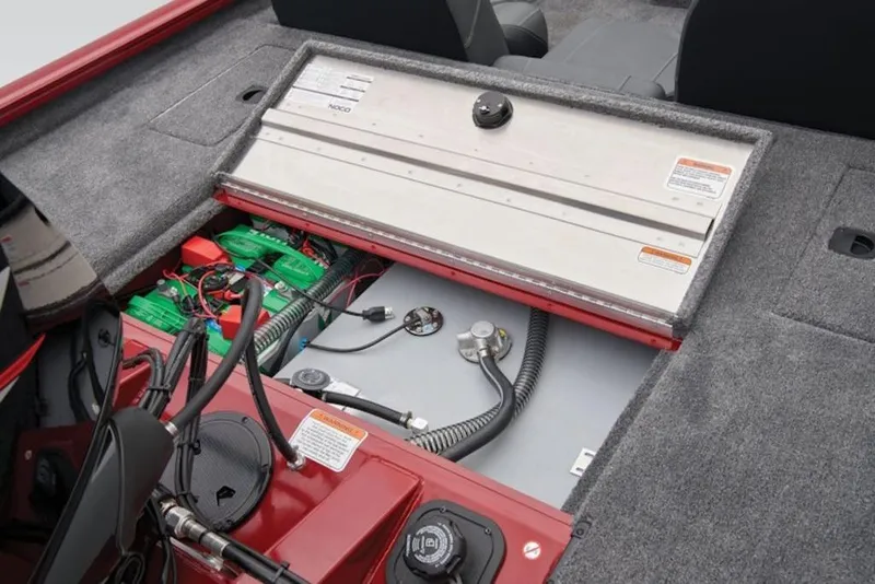 Slide: The Image of 2025 Tracker Pro Team 175 boat interior showing battery compartment and wiring. - 8