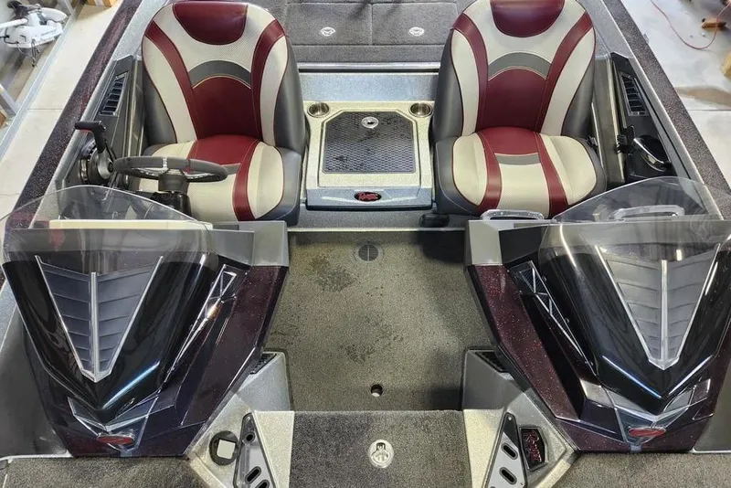 Slide: The Image of 2018 Ranger Z521L boat interior with dual seats and steering console. - 10