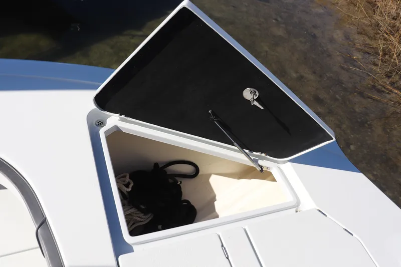 Slide: The Image of 2021 Costa Custom Boats 26 with Mercury Pro XS engines docked at marina. - 14