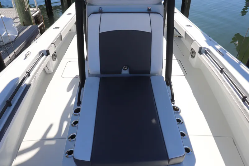Slide: The Image of 2021 Costa Custom Boats 26 with dual Mercury Pro XS engines at dock. - 21