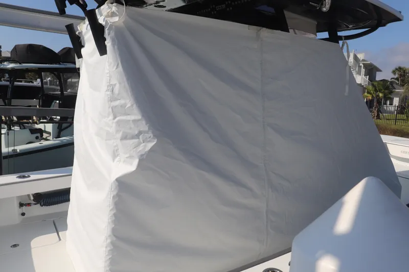 Slide: The Image of 2021 Costa Custom Boats 26 with protective cover on deck. - 6