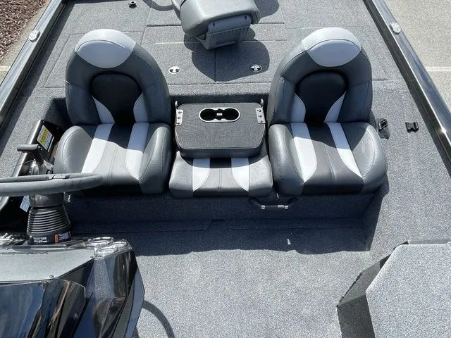 Slide: The Image of 2023 Vexus AVX181 boat interior with dual seats and center console. - 12