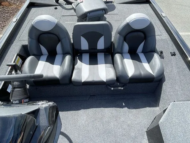 Slide: The Image of 2023 Vexus AVX181 boat interior with three gray and black seats. - 13