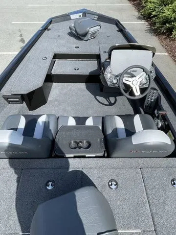 Slide: The Image of 2023 Vexus AVX181 boat interior with gray seating and steering console. - 4