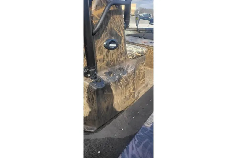 Slide: The Image of 2020 G3 Gator Tough 17 CC boat interior with camouflage design and seating. - 5