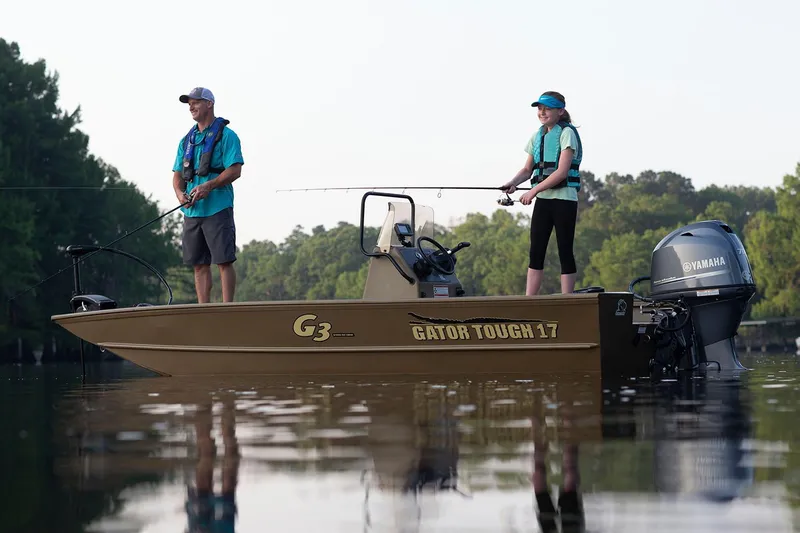 Slide: The Image of Manufacturer Provided Image: 2020 G3 Gator Tough 17 CC boat with two people fishing on a calm lake. - 8