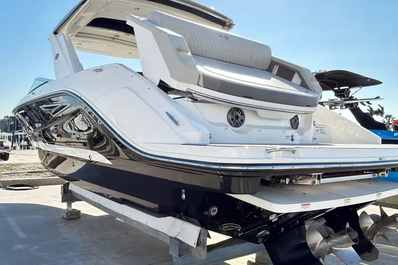Slide: The Image of 2020 Sea Ray SLX 310 boat on display, showcasing sleek design and modern features. - 14