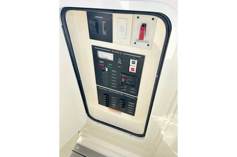 Slide: The Image of Electrical control panel on a 2020 Sea Ray SLX 310 boat. - 18