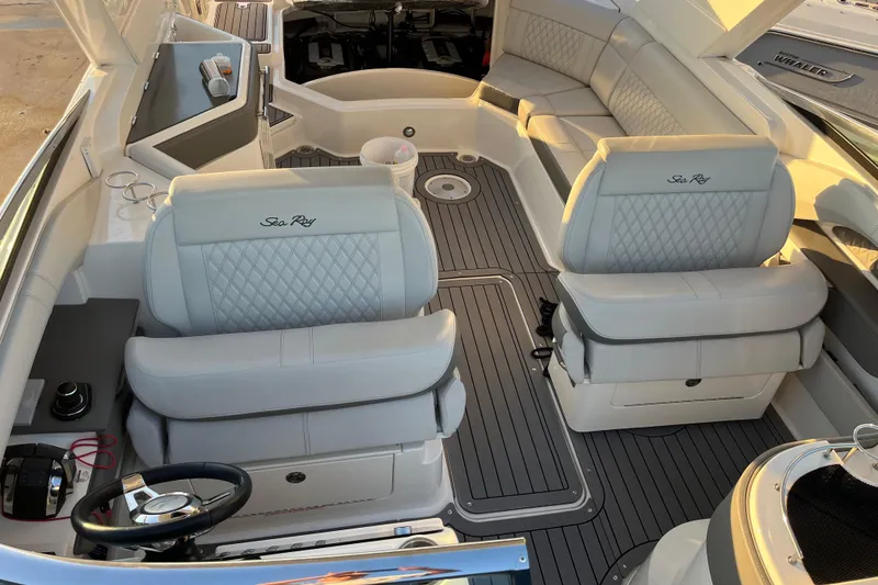 Slide: The Image of Luxurious interior of 2020 Sea Ray SLX 310 boat with plush seating and modern design. - 37