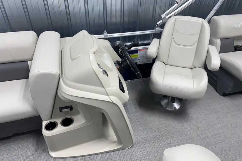 Slide: The Image of Interior of 2026 SunChaser Vista 20 LR boat with plush seating and steering console. - 5