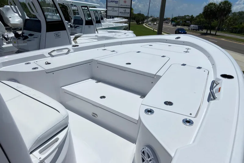 Slide: The Image of 2026 Sportsman Masters 227 Bay Boat with spacious deck and seating, ideal for fishing adventures. - 22