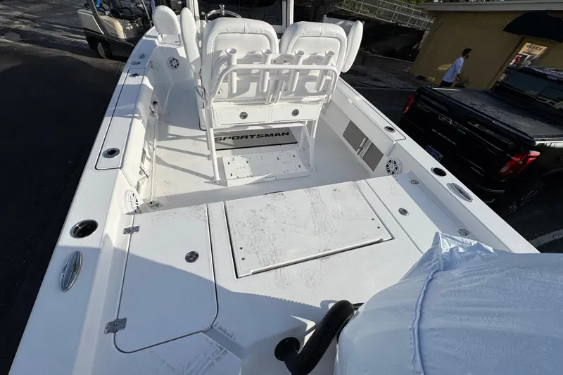 Slide: The Image of 2026 Sportsman Masters 227 Bay Boat interior with seating and storage compartments. - 5