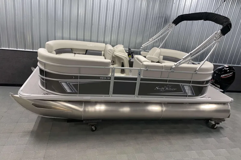 The Image of 2026 SunChaser Vista 18 LR pontoon boat with sleek design and comfortable seating. - 0