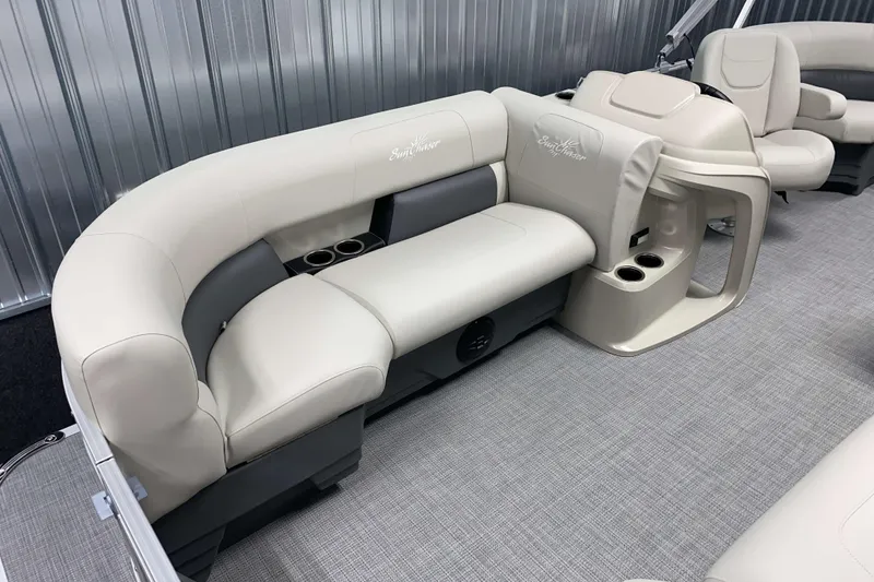 Slide: The Image of Luxurious seating on 2026 SunChaser Vista 18 LR pontoon boat, featuring cup holders and modern design. - 12