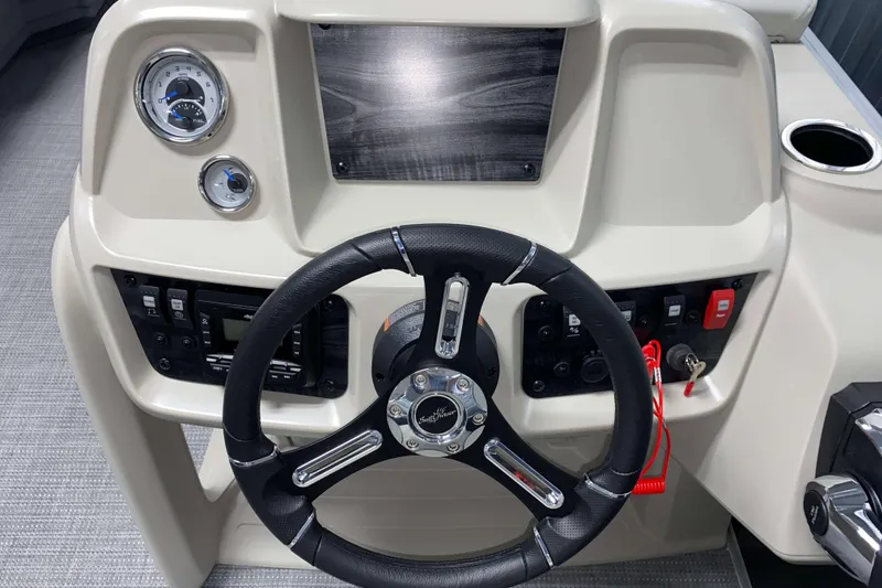 Slide: The Image of Steering console of 2026 SunChaser Vista 18 LR boat with gauges and controls. - 9