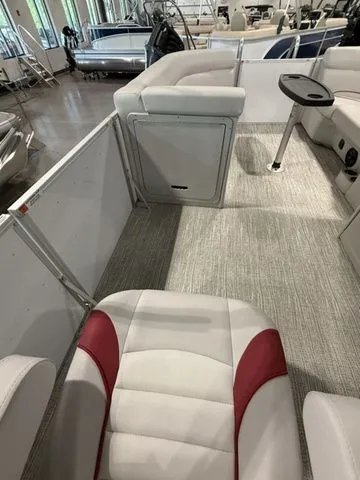 Slide: The Image of 2023 SunCatcher Select 20RC boat interior with plush seating and modern design. - 10