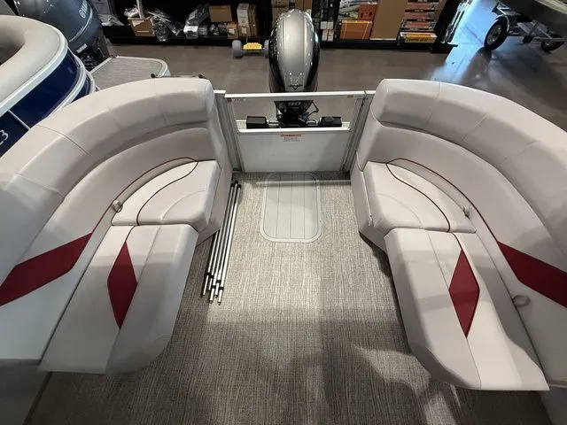 Slide: The Image of 2023 SunCatcher Select 20RC boat interior with plush seating and modern design. - 6
