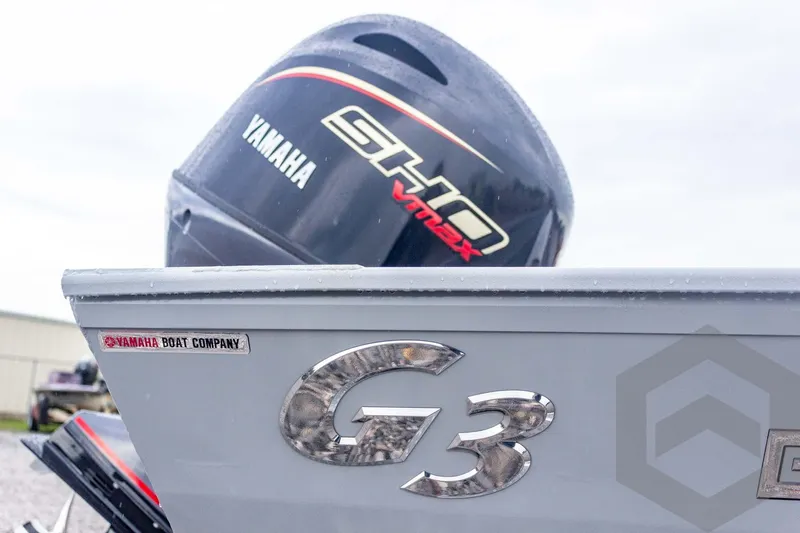 Slide: The Image of 2026 G3 Bay 20 boat with Yamaha engine, showcasing sleek design and branding. - 16