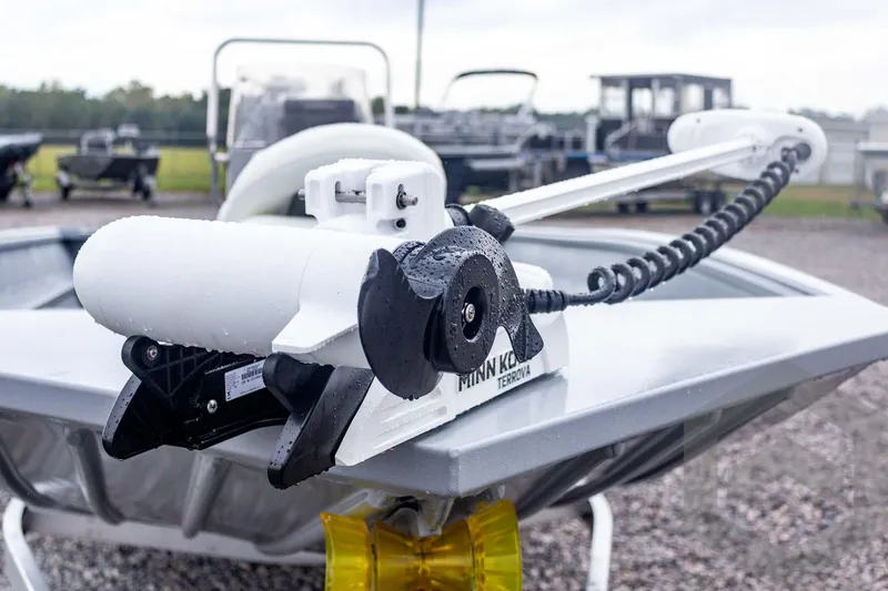 Slide: The Image of Minn Kota Terrova trolling motor on 2026 G3 Bay 20 boat, wet with raindrops. - 19