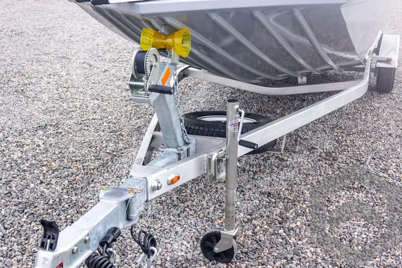 Slide: The Image of Trailer hitch of 2026 G3 Bay 20 boat on gravel surface. - 20